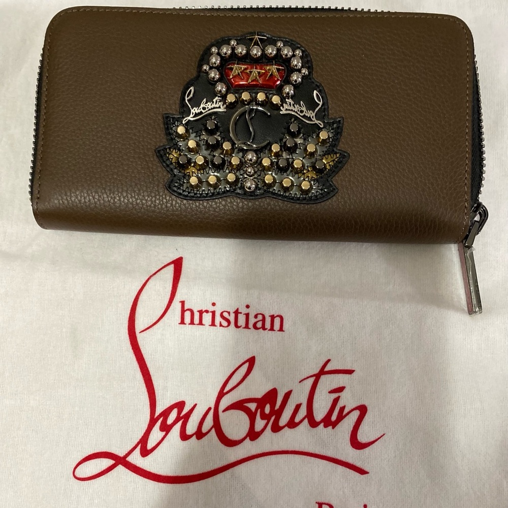 Christian Louboutin
Brown Leather Panettone Zip Around Wallet